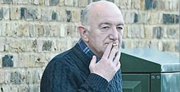 5461404-6322461-wearing_a_sensible_navy_jumper_the_balding_man_grinding_out_a_ci-m-9_1540593837788