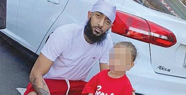 11702180-6871463-rip_rapper_nipsey_hussle_pictured_sunday_moments_before_he_died_-m-9_1554087057376