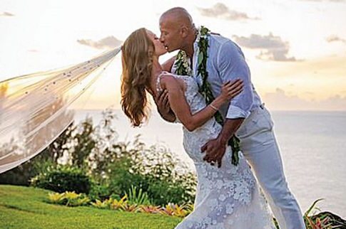 17461470-7373295-going_for_it_dwayne_the_rock_johnson_kissed_his_bride_lauren_has-a-1_1566262828356