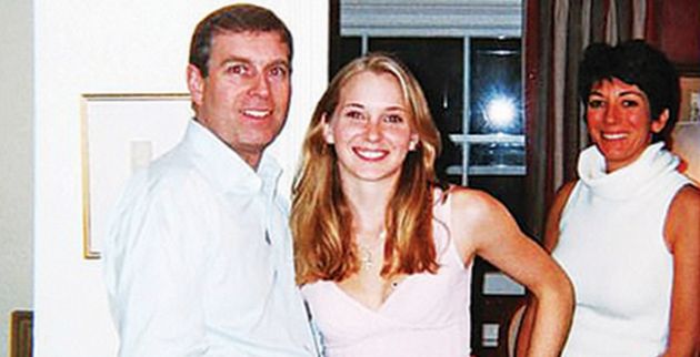 f1_17412614-7371693-a_photo_of_prince_andrew_grinning_with_his_arm_around_the_bare_m-a-30_1566224316663