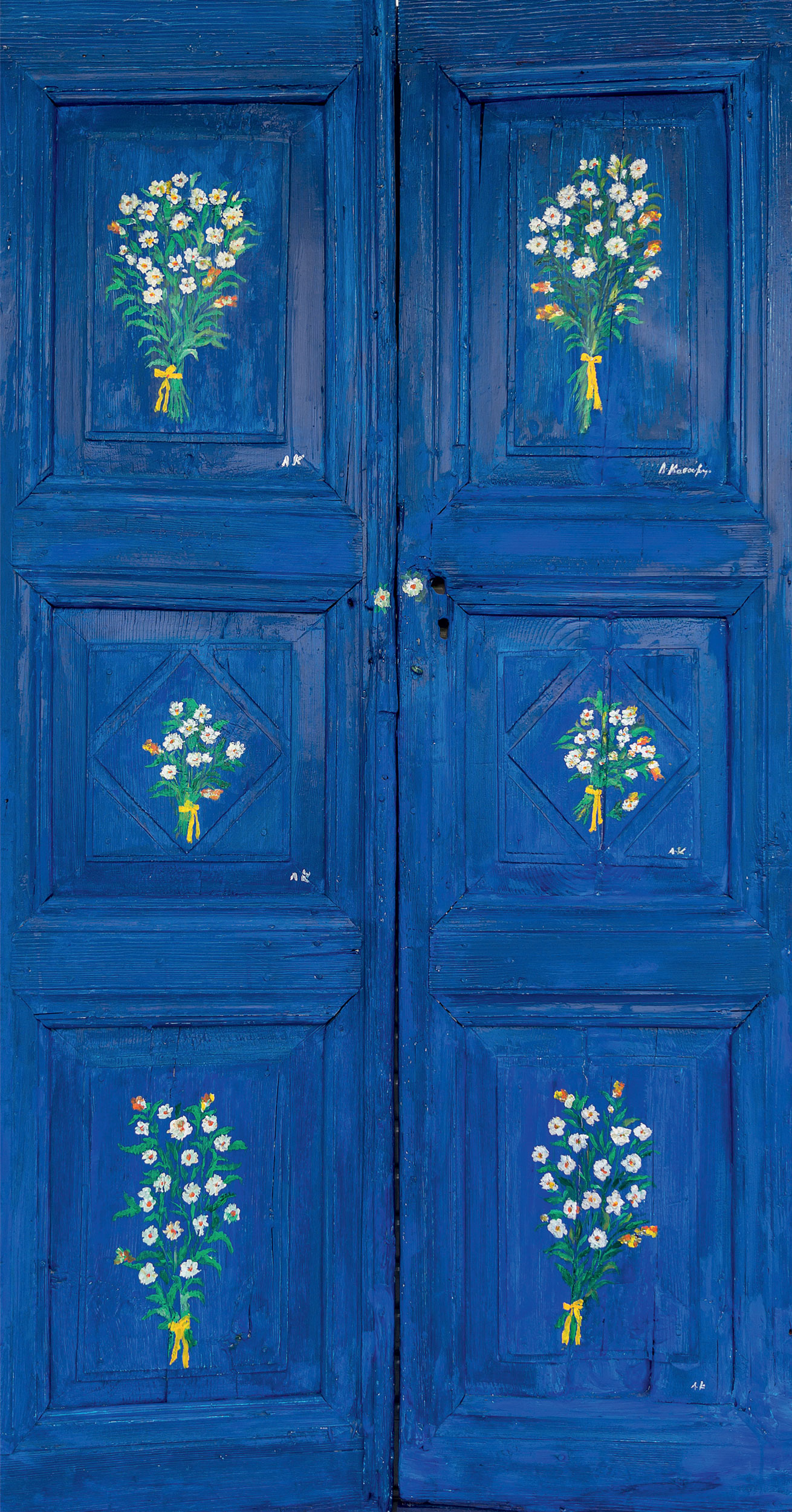μπλε πορτα με λουλουδια