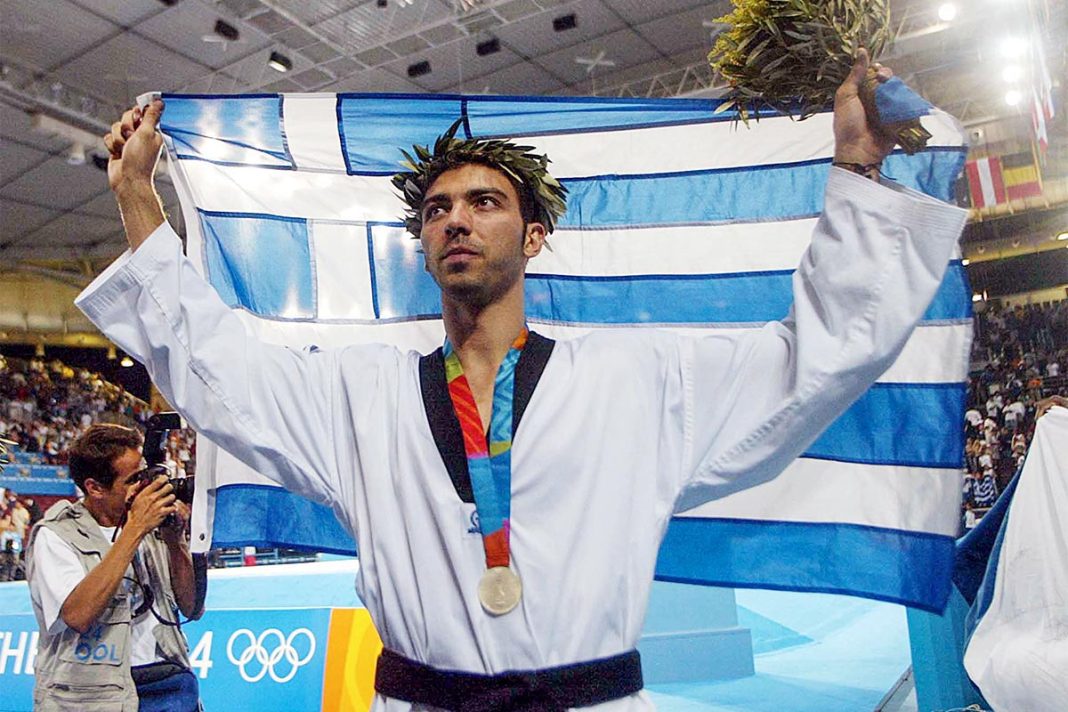 Σε δημοπρασία τα δύο ολυμπιακά μετάλλια και τρεις δάδες του Αλέξανδρου Νικολαΐδη