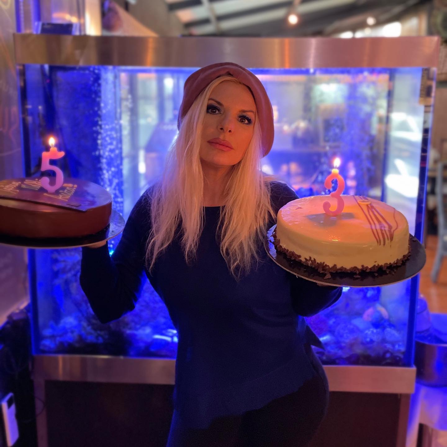 Photo by Annita Pania on April 25 2023. May be an image of 1 person blonde hair and chocolate cake