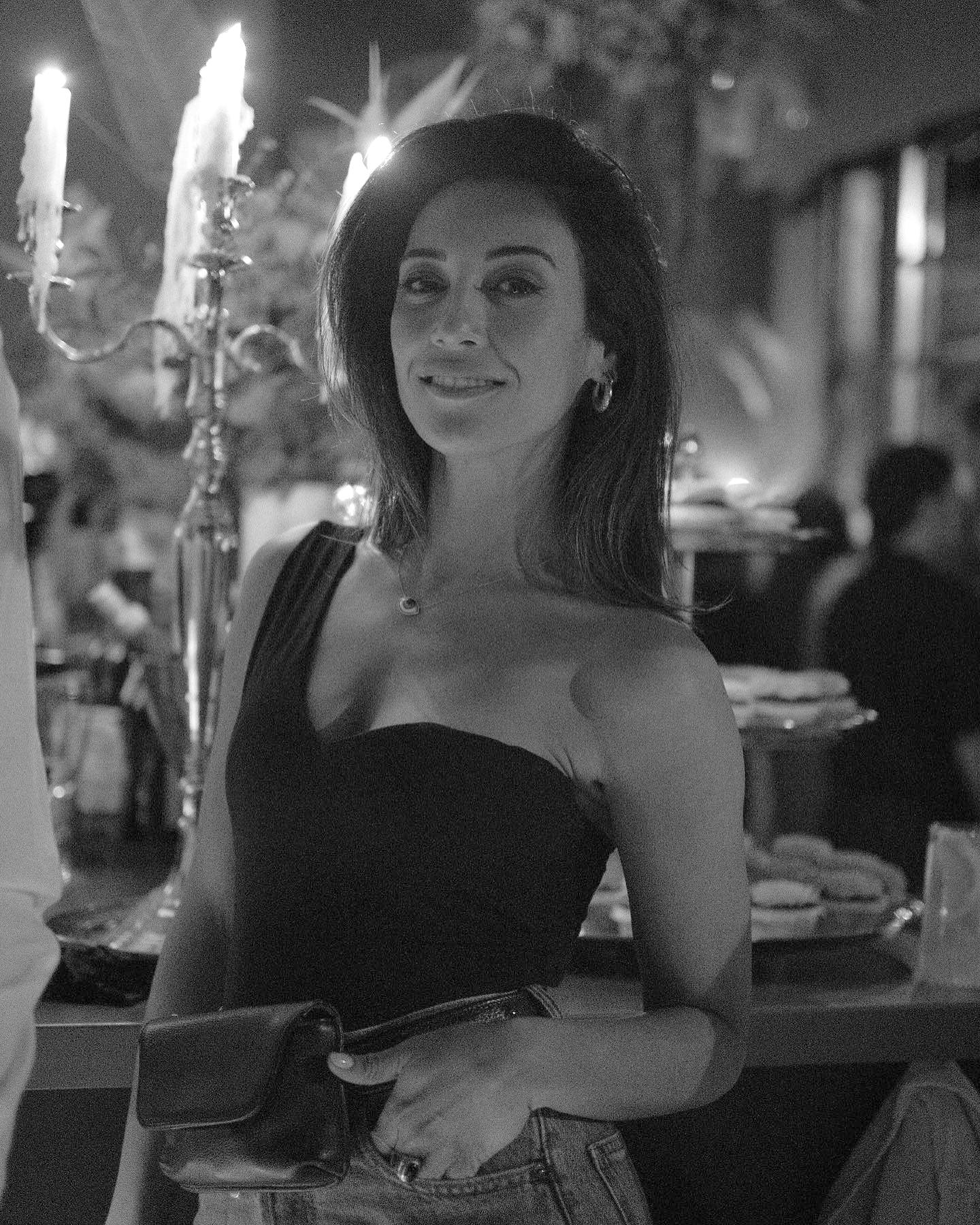Photo shared by Evgenia Samara on April 20 2023 tagging @thecedition official and @bariero athens. May be a black and white image of 1 person candle holder candle and chandelier