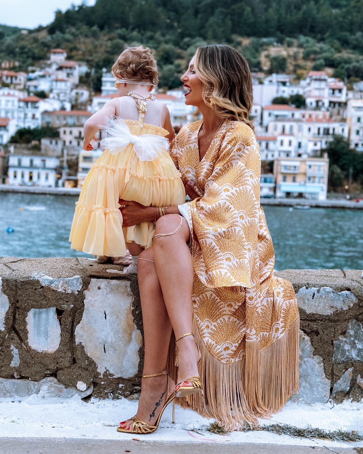Photo by Athina on May 22 2023. May be an image of 2 people baby dress sundress and Camogli. 1