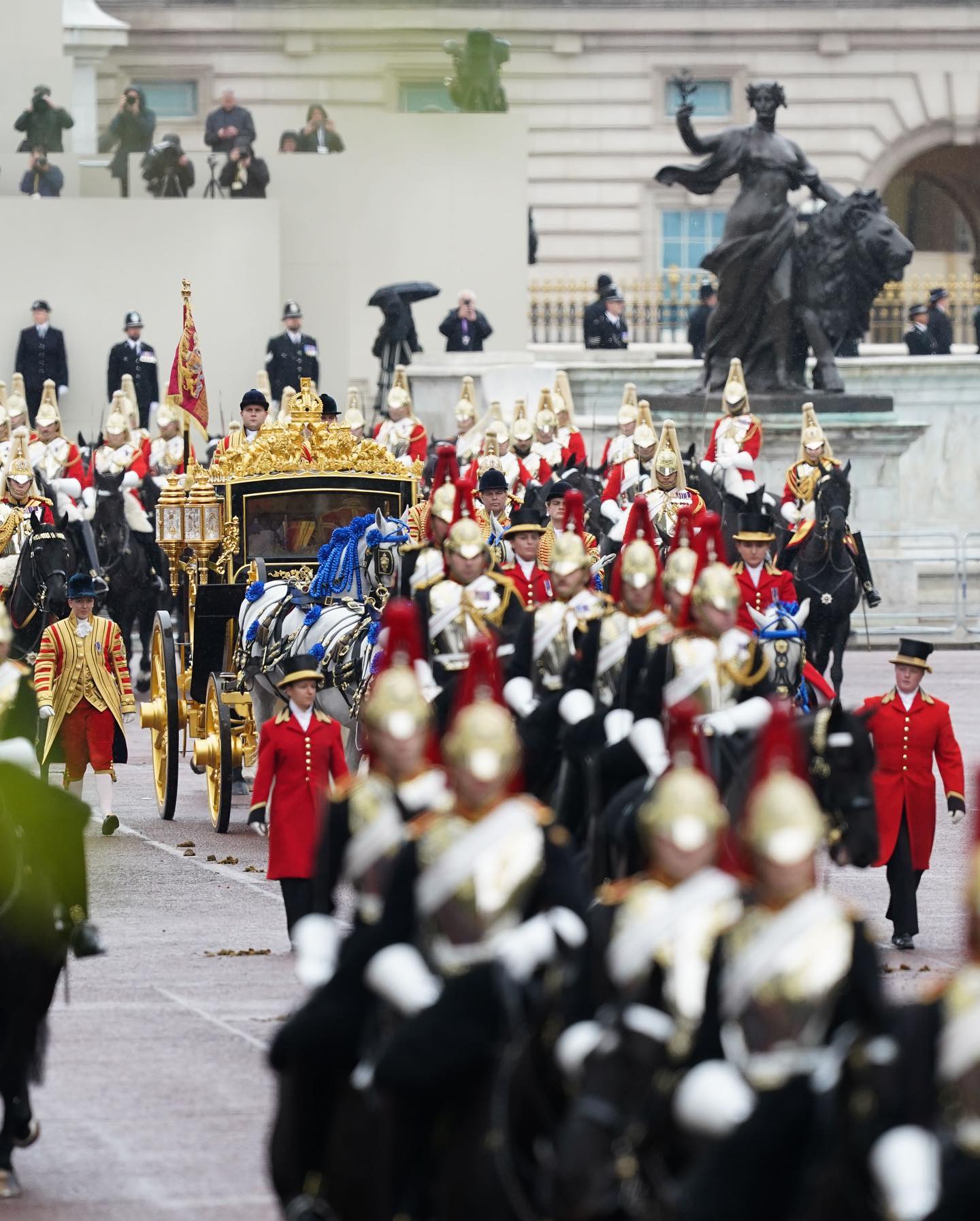 Photo by The Royal Family on May 06 2023. May be an image of 11 people military uniform the Brandenburg Gate crowd and