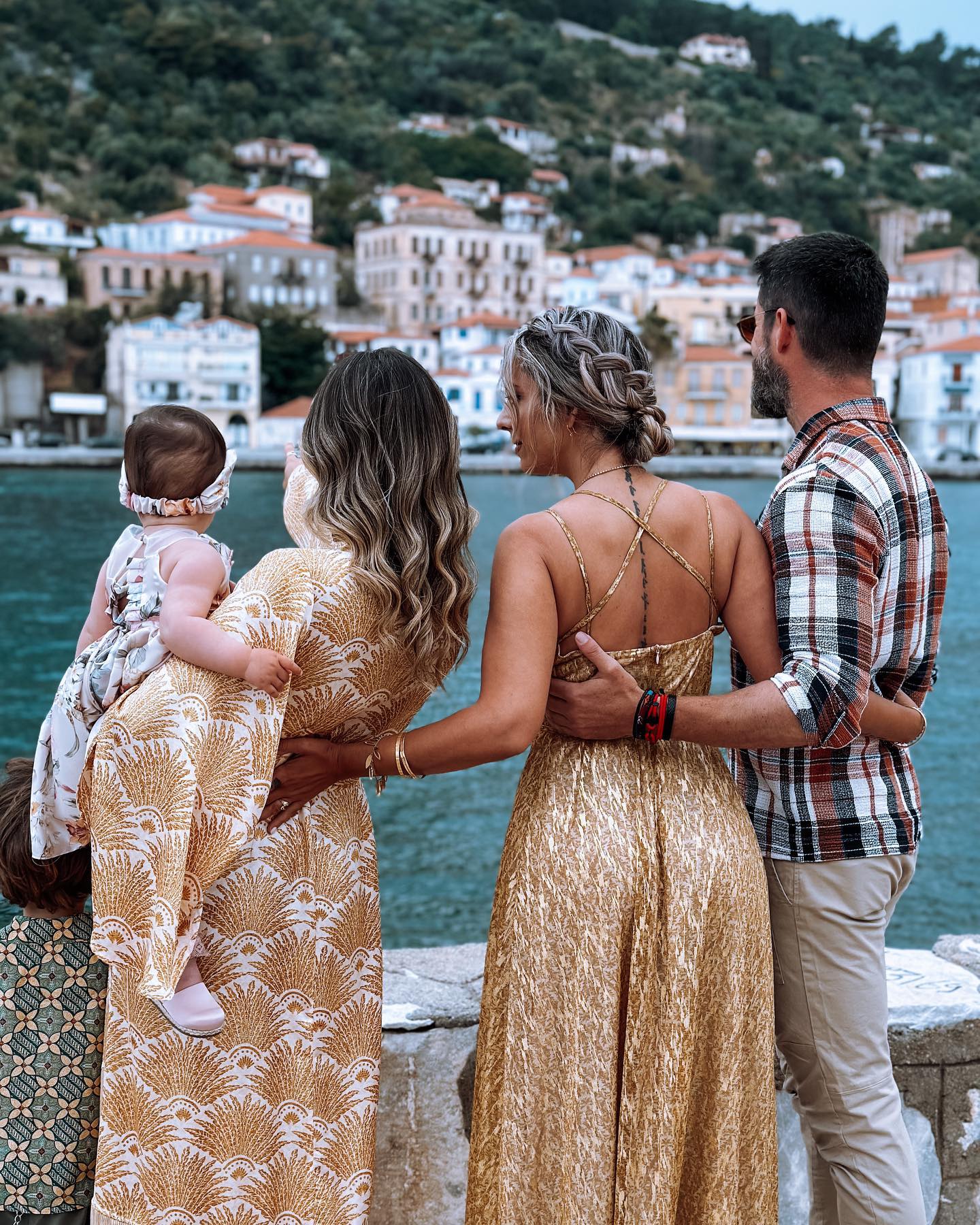 Photo shared by Athina on May 21 2023 tagging @n1k1tas o1konomakos and @demieone. May be an image of 3 people baby sundress and Camogli