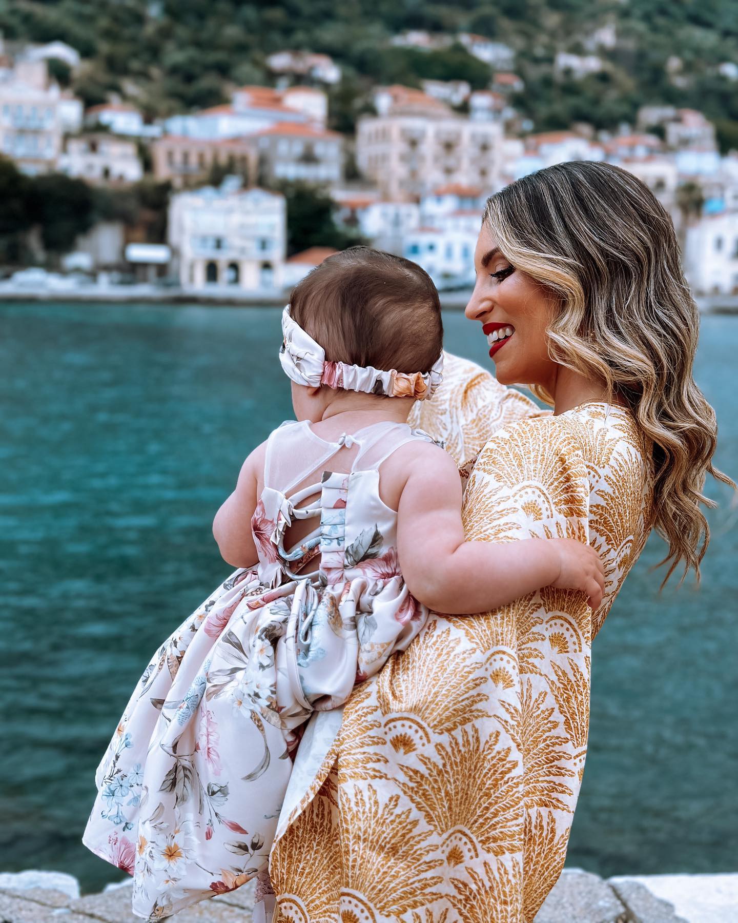 Photo shared by Athina on May 21 2023 tagging @vintelibyvivianchatzeli. May be an image of 2 people baby dress sundress headscarf and Camogli