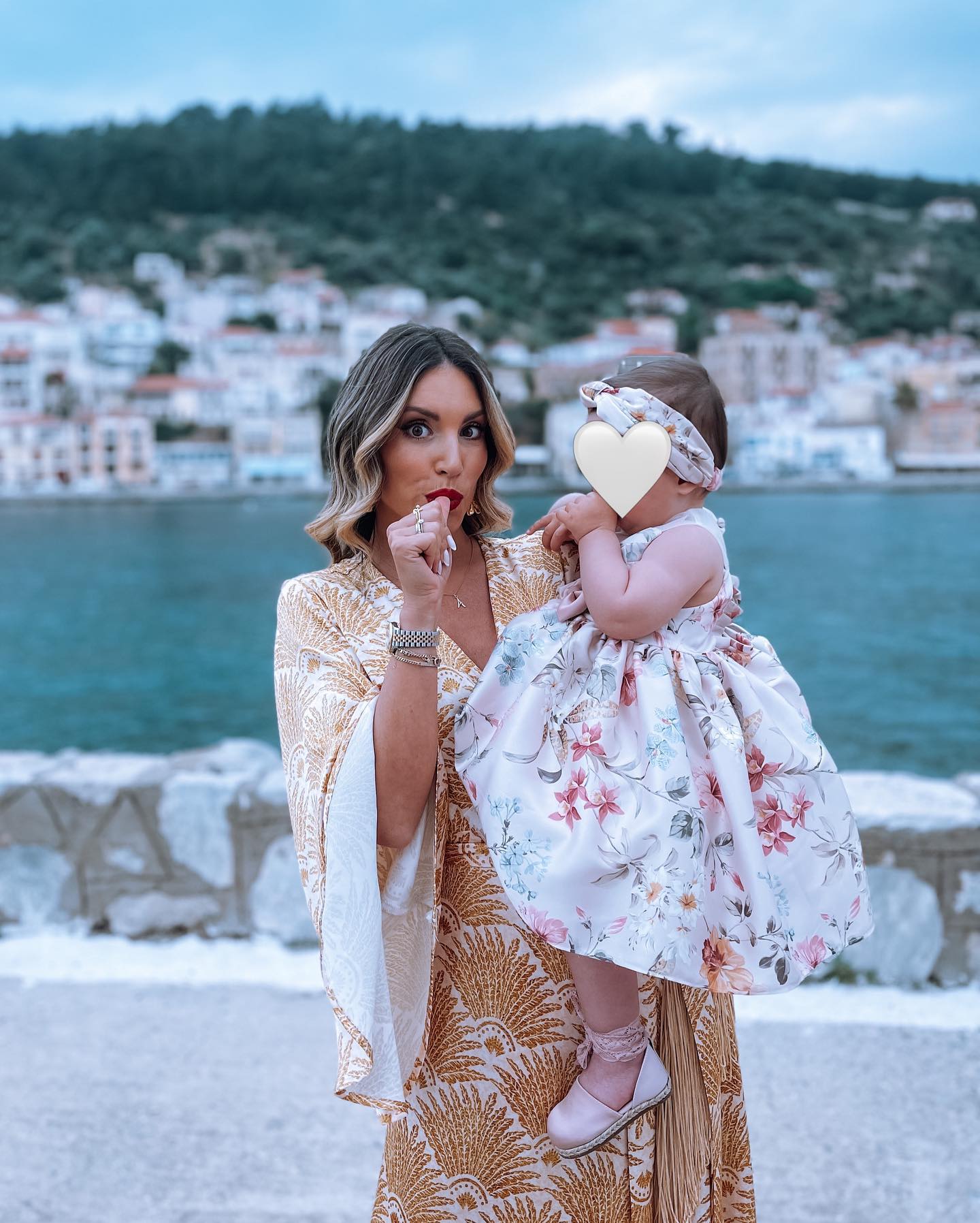 Photo shared by Athina on May 22 2023 tagging @babywalker.gr . May be an image of 2 people baby dress headscarf Camogli and outdoors. 1