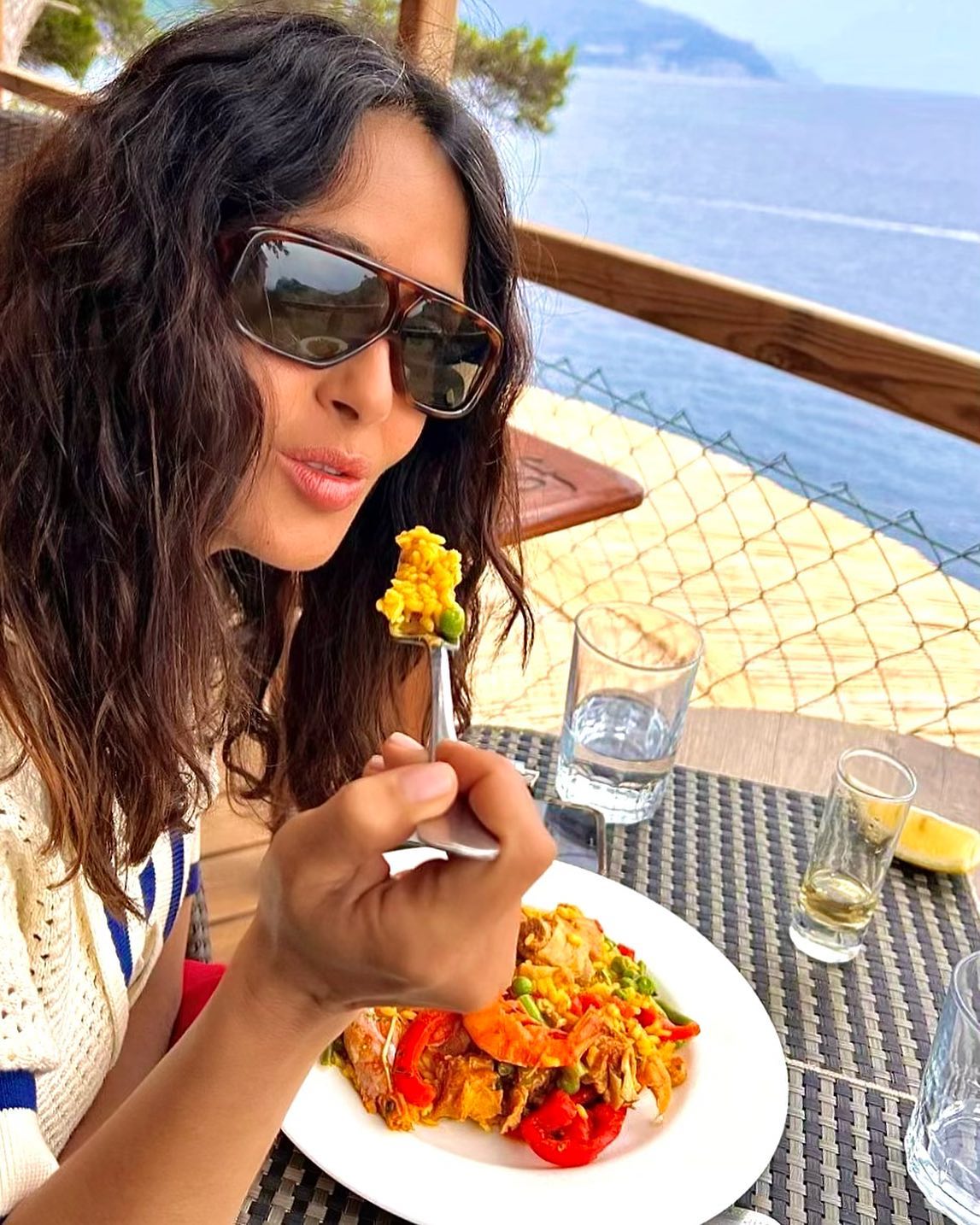 Photo by Salma Hayek Pinault on June 25 2023. May be an image of 1 person paella and
