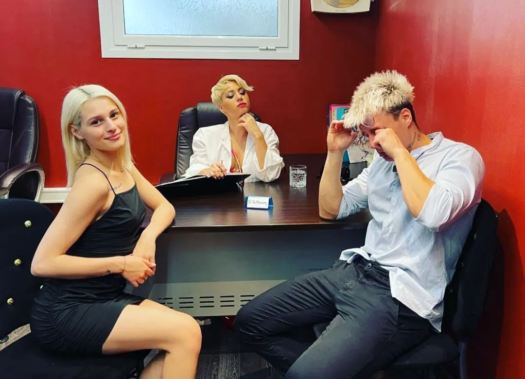 Photo shared by Afroditi Adami on July 09 2023 tagging @philstrife @christy.white and @sugarbabestteam. May be an image of 2 people blonde hair people smoking telephone cigarette suit and