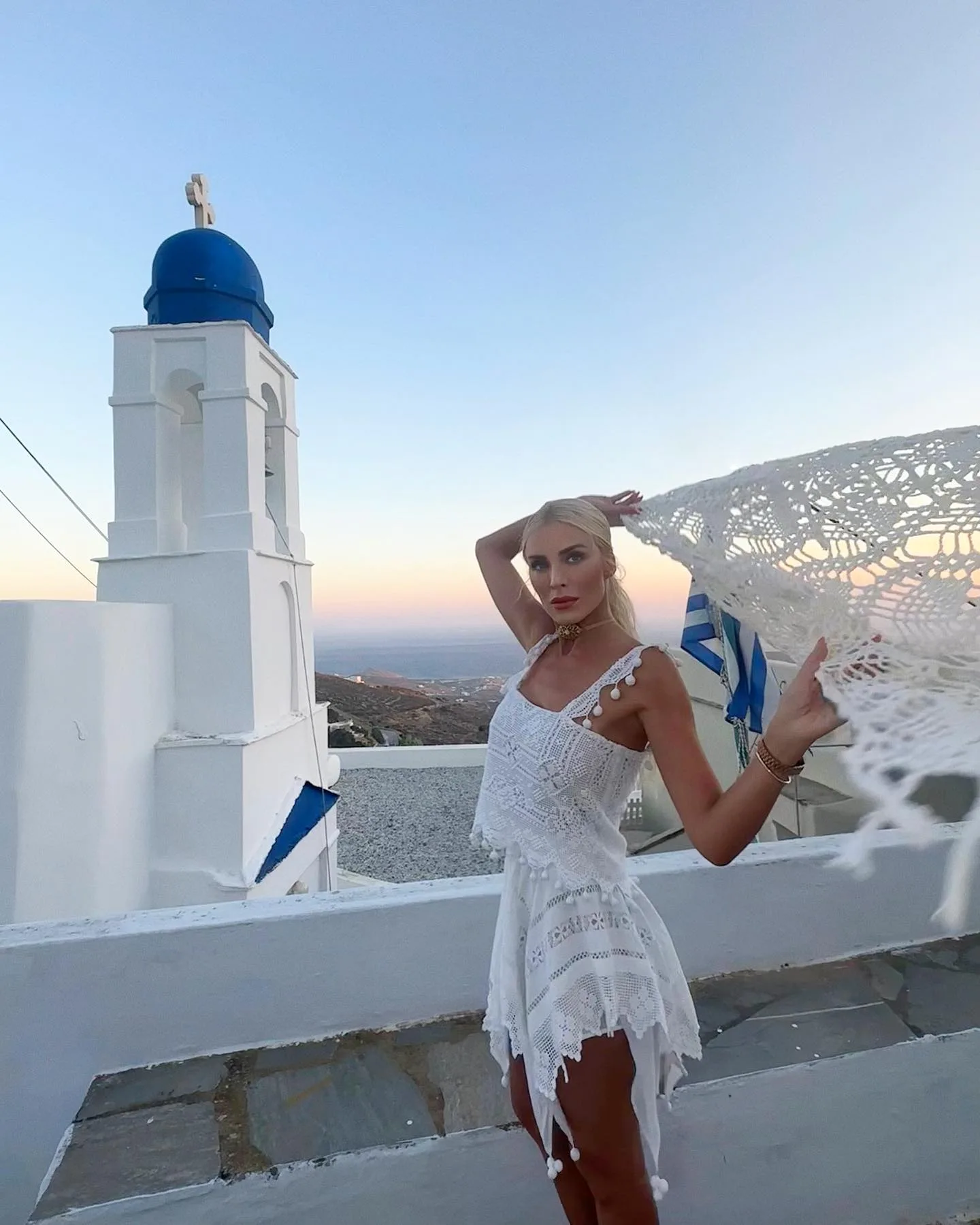 Photo by Katerina Kainourgiou Official on August 15 2023. May be an image of 1 person and Santorini jpg
