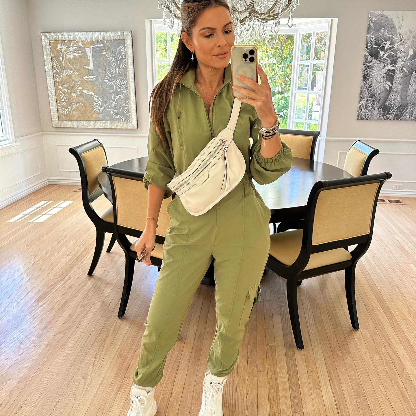 Photo shared by MARIA MENOUNOS on August 14 2023 tagging @janeylopatypr @thrivesociete and @threestoriesjewelry. May be an image of 1 person drawstring jumpsuit and sweatsuit