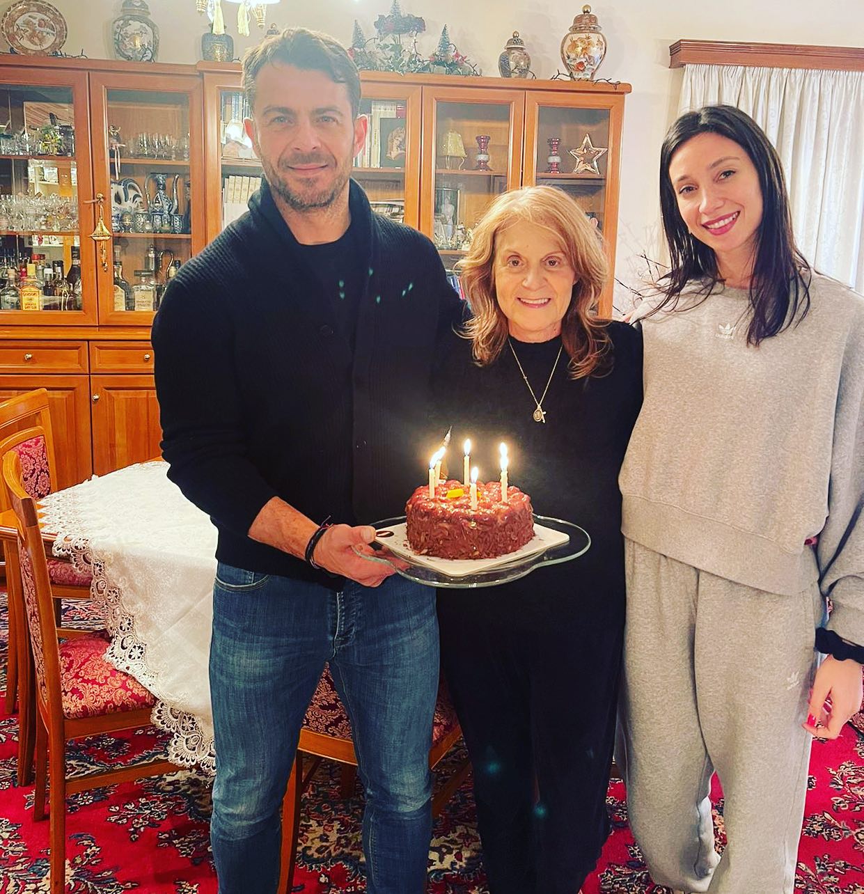 Photo shared by George Angelopoulos on September 25 2023 tagging @dimitravmk. May be an image of 3 people candle chocolate cake and pie